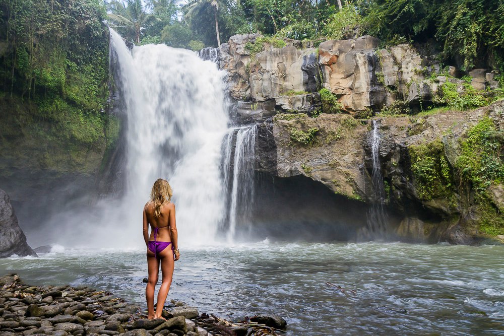 Young woman at Tegenungan Waterfall near Ubud - Mari Bali Tours